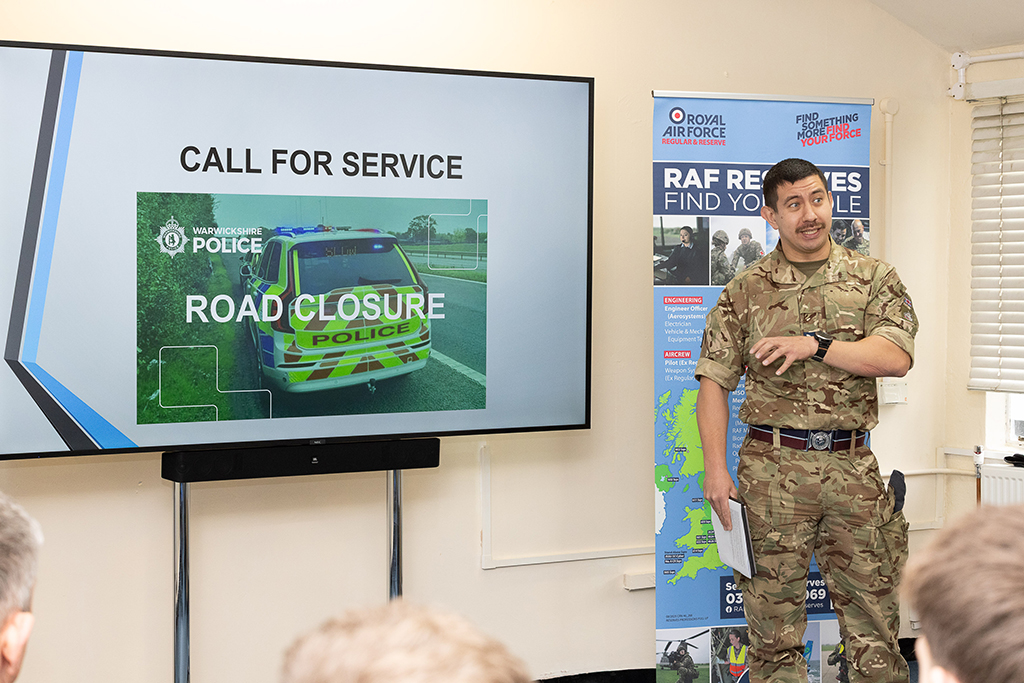 Corporal Boswell delivers a Safety Week brief to the gathered audience